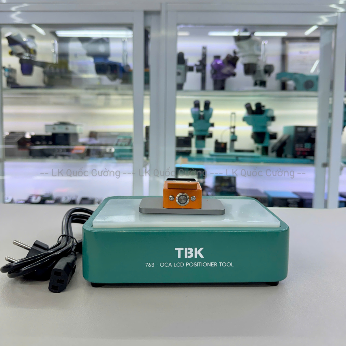 Máy định vị vô keo kính TBK-763