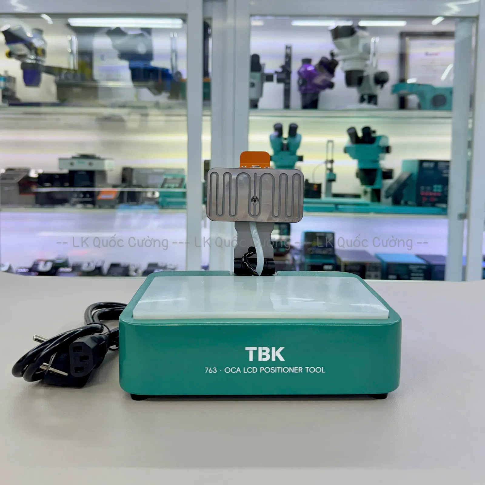 Máy định vị vô keo kính TBK-763